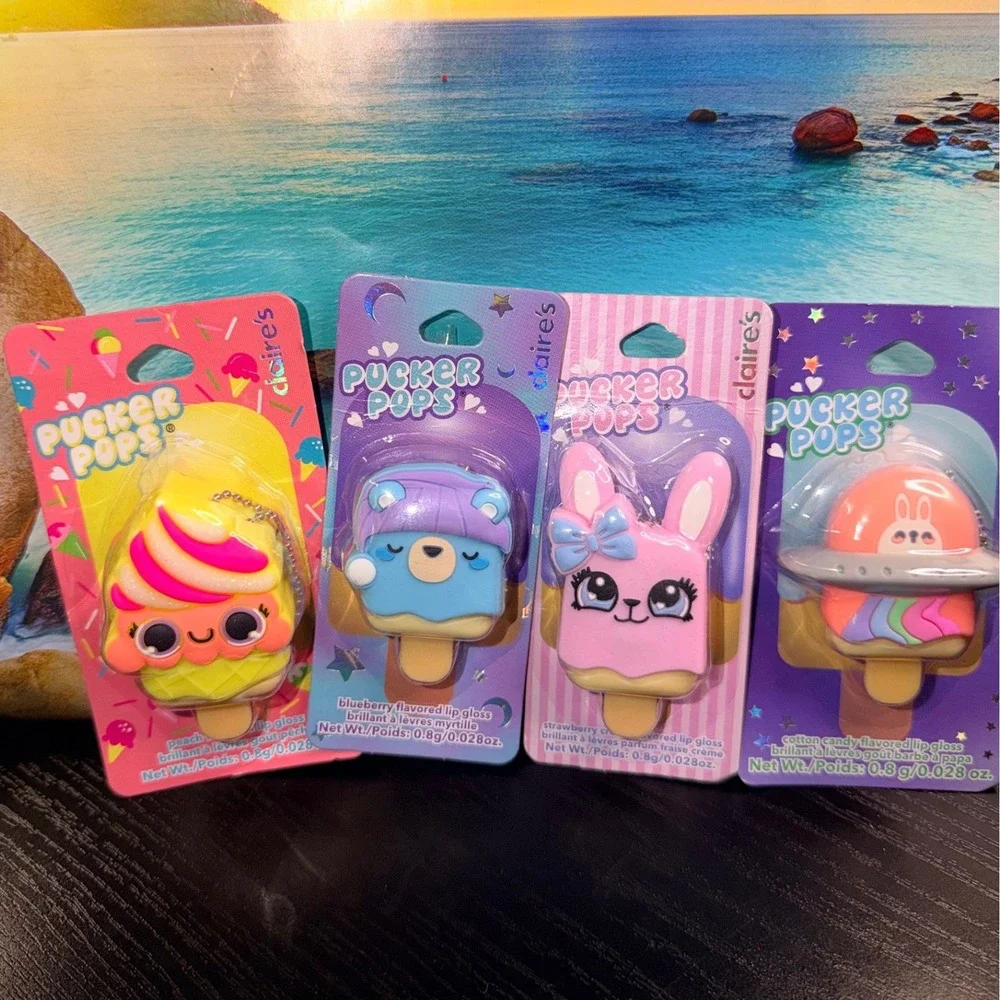 Claire's Pucker Pops Lip Gloss 4 Pack Peach Blueberry Strawberry Cotton Candy